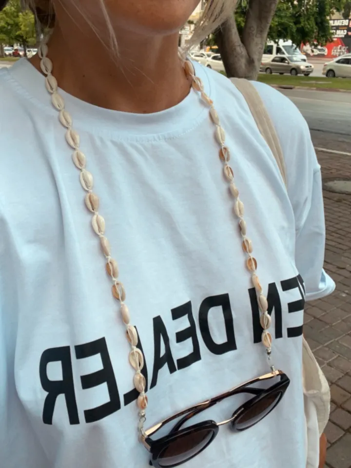 Cowrie shell sunglasses chain / boho accessories /eye glass holder handmade / coachella style / sunglasses puka cord