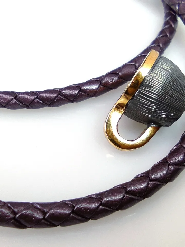 Set of miniature cup and gaitan (cord)