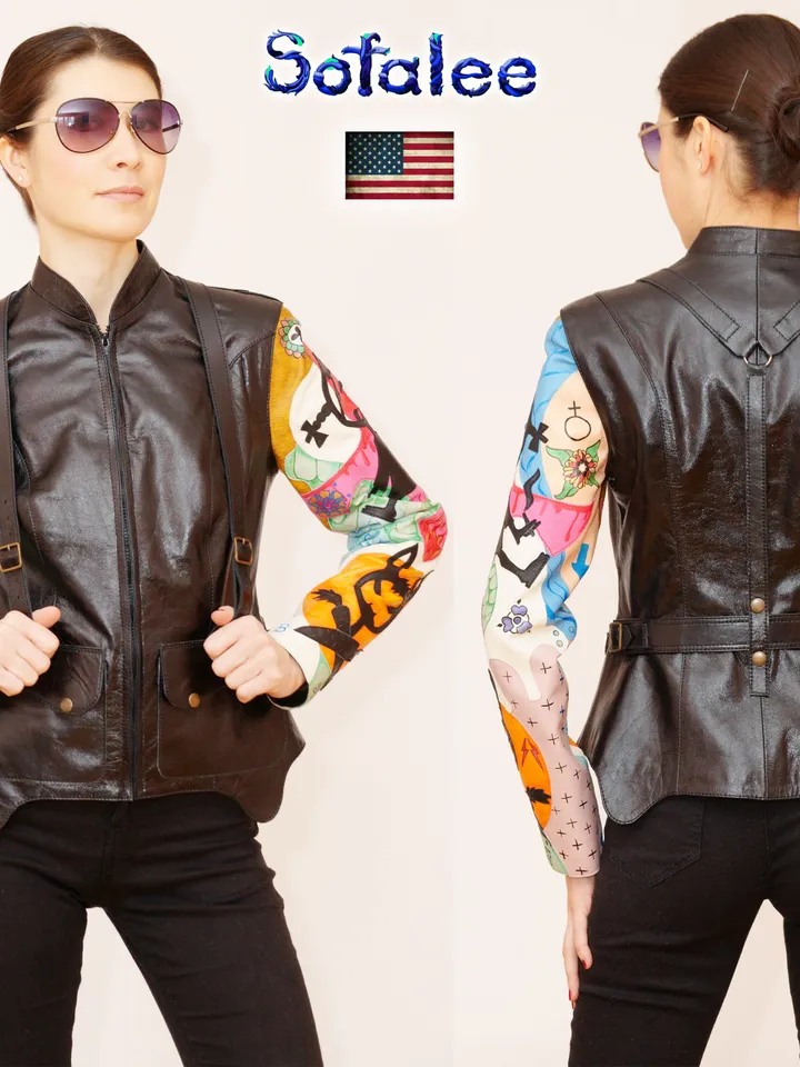 Exclusive women's handmade genuine black leather jacket bright applications sleeves. Painting lamb on leather clothes.