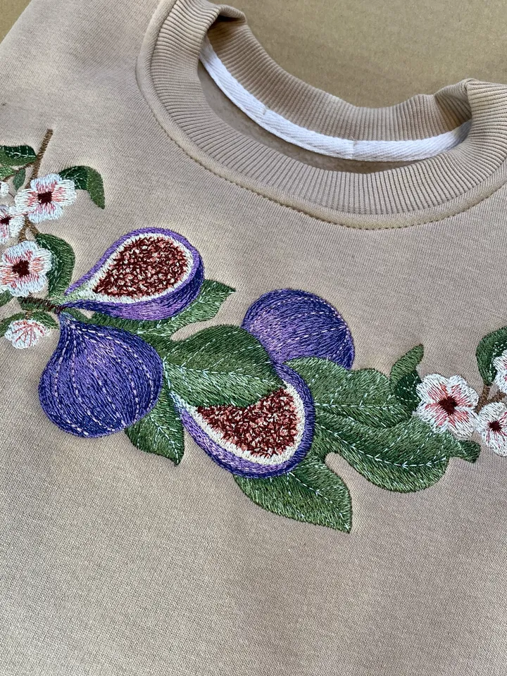 Embroidery of fig fruits and leaves will ideally complement images and accessories in oriental style