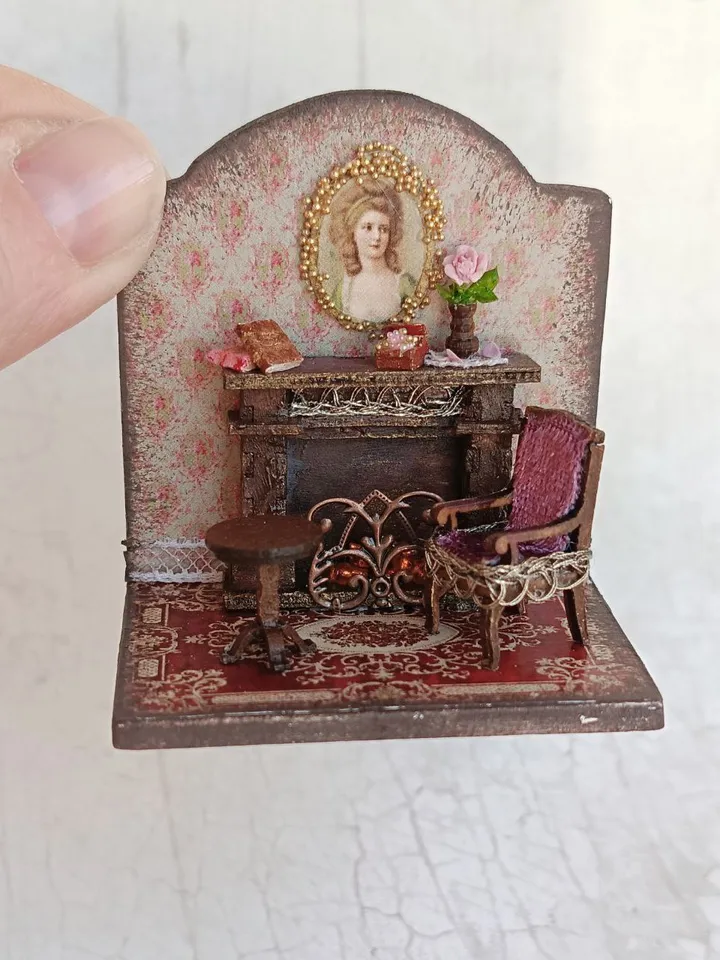 Miniature Fireplace Room Roombox is a 1/48 scale miniature dollhouse with a shimmering fireplace, furniture and accessories