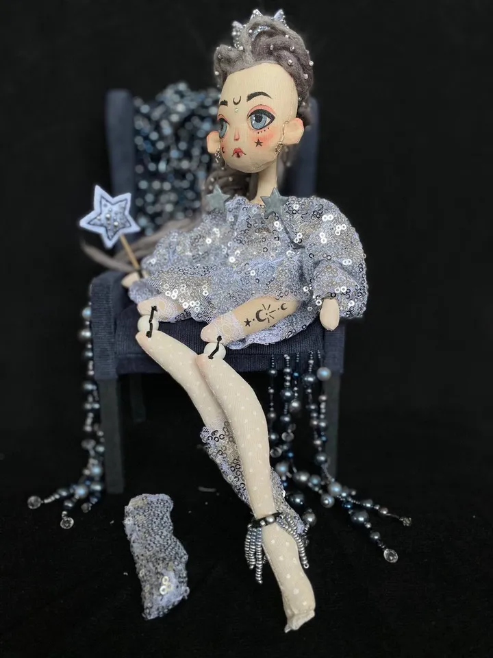 White Queen doll with dreadlocks and tattoos