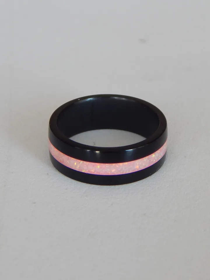 Stylish black ring. Carbon ring with synthetic opal. 5 3/4