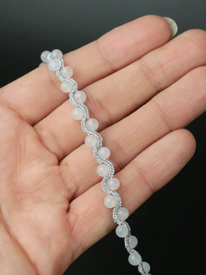 Braided bracelet from metallic thread