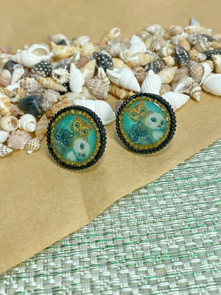 Handmade stud earrings. Earrings with images of cats.