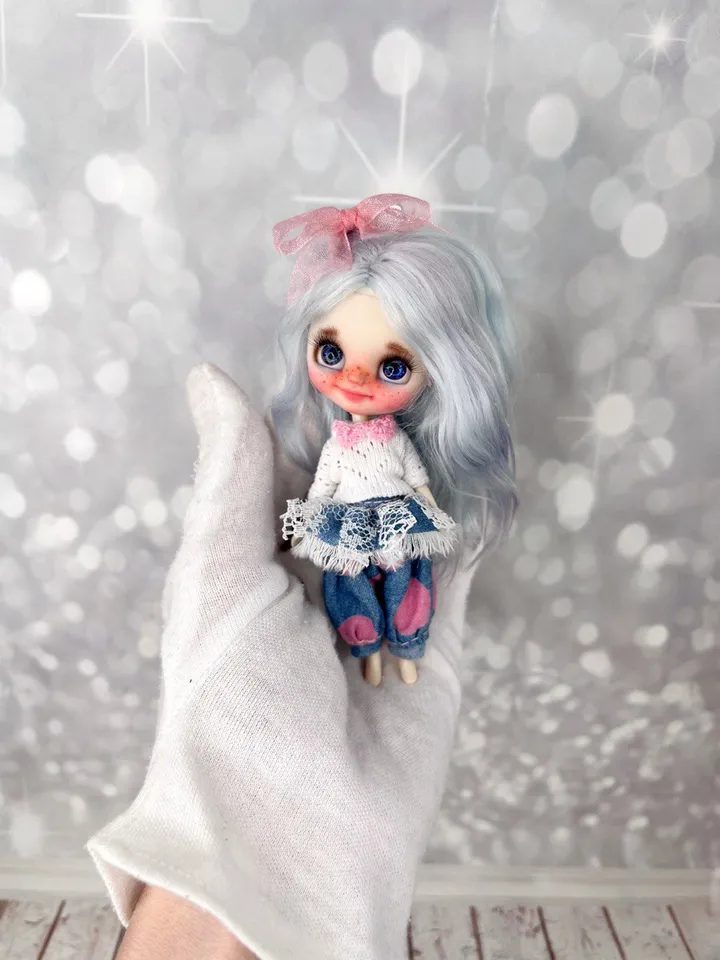 Small Blythe doll with blue eyes. Beautiful miniature Blythe doll with blue hair.