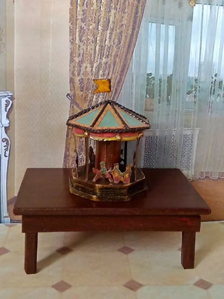 Miniature carousel. Dollhouse miniature.1:12 scale.