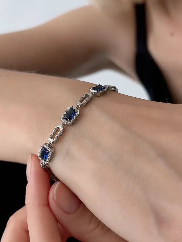 Women's silver bracelet 925 assay value with sapphire crystals and cubic zirconia