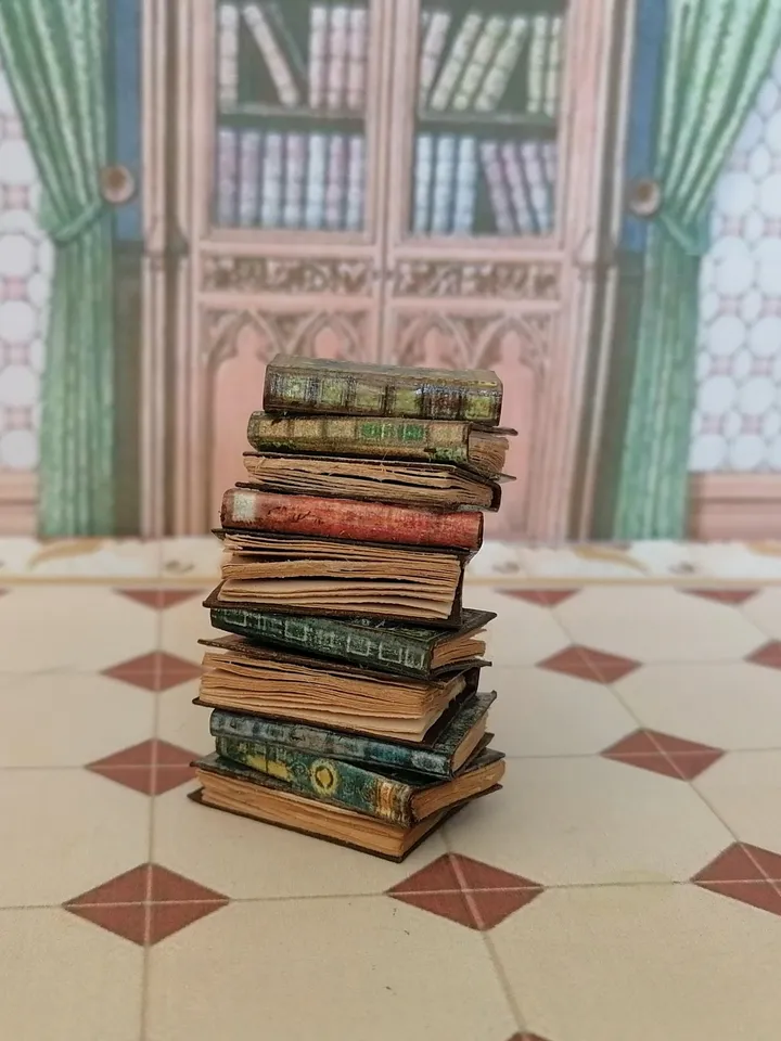 Stack of aged, vintage books. Imitation books. Dollhouse miniature. 1:12. Handmade.
