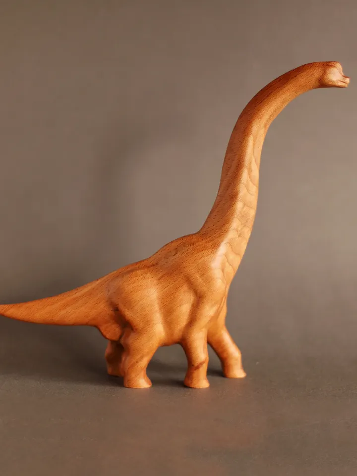 Wooden hand carved dinosaur brachiosaurus