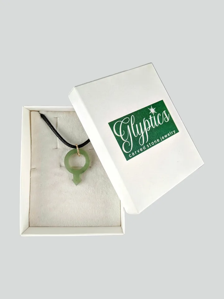 Green jade pendant gender male sign symbol of Mars LGBTQ.