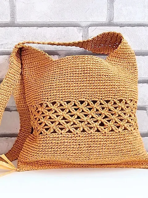 Straw tote bag with a cute argure trim for the beach party!