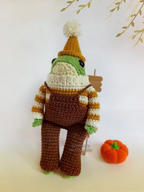 Soft flexible handmade toy frog, Crocheted toad in a sweater and pants.