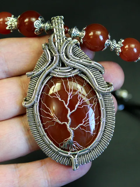 The Tree of Life necklace is handmade with natural birthstones.