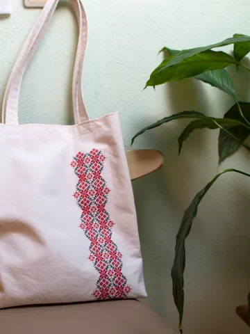 Hand embroidered tote bag "Tradition" with Belarusian folk ornament. Made of natural cotton with cross-stitch embroidery, linen lining and magnetic closure. Unique handmade gift preserving cultural heritage $43.00
