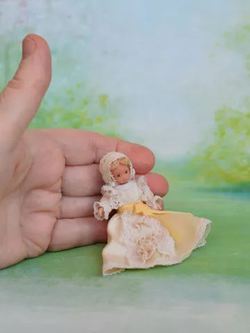 Miniature baby doll for Victorian dollhouse in 1/12 scale. $145.00