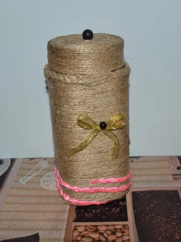 unique cans of perishable food(glass jar) wrapped entirely in natural jute rope