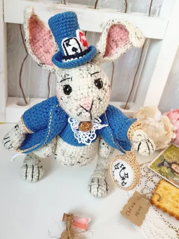 Crochet pattern White rabbit with clock $8.50