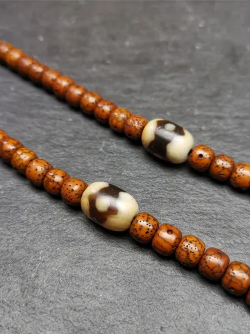 Gandhanra Tibetan Mandala 3 Eyes Dzi Bead Accessories,Dzi Spacer Beads,Marker Beads for Mala,Necklace,Amulet,0.4" × 0.55" $29.99