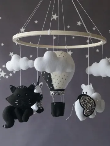 Unisex monochrome baby mobile, contrasting black and white balloon with soaring clouds $130.00