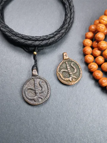Gandhanra Handmade Tibetan Buddhist Amulet Pendant,Rod of Asclepius,Snake Stick, Made of Brass,0.87" $29.99