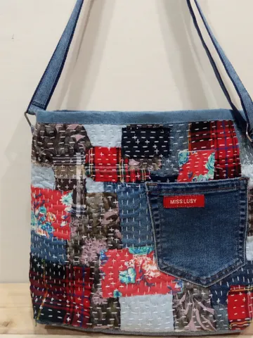 Pretty quilted handbag in the patchwork and boro style made of pieces of denim and cotton $59.00