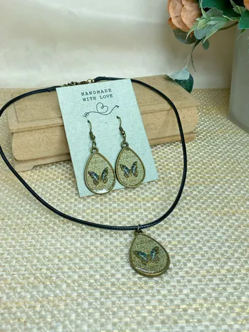 Handmade jewelry set. Shiny butterflies in a bronze frame. designer jewelry. $28.00