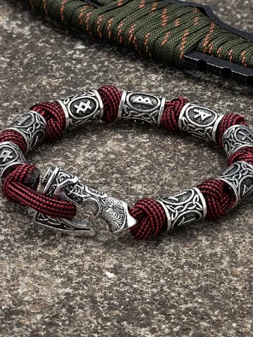 Handmade paracord and stainless steel bracelet with Viking runes $49.00