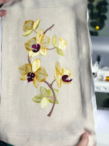 Orchid machine embroidery design using artistic satin stitch technique $11.55