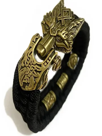 Paracord and bronze bracelet with wolf head $99.00