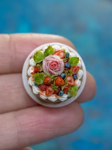 MINIATURE cake with rose and berries on a ceramic plate  3 $63.00