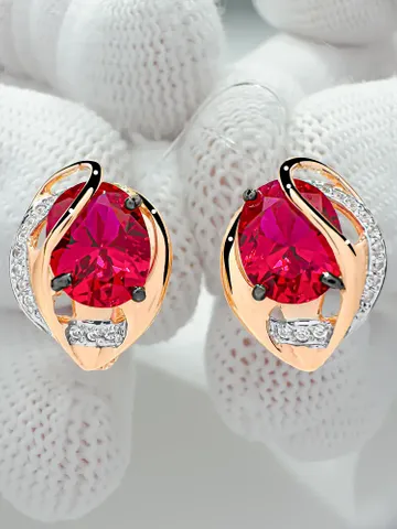 Earrings made of 925 silver (585 gold plated) with corundum and ruby $125.00