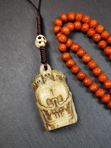 Gandhanra Tibetan Amulet,Yak Bone Carved Skull Masters of Sitavana Badge, Hand-carved Skull Pendant $59.99