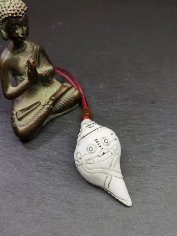 Gandhanra Tibetan Buddhism Amulet,Hand Carved White Conch Shell Shankha with Skull Citipati Symbol,Tibetan Ritual Implement - 2.28" × 1.18" $99.99