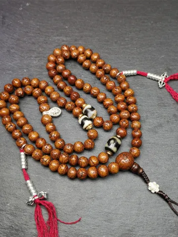 Gandhanra Old Tibetan Mala,Authentic 10mm 108 Dragon Eyes Bodhi Prayer Beads,with Dzi Spacer Beads,Silver Counters,40 Inches Length $359.99