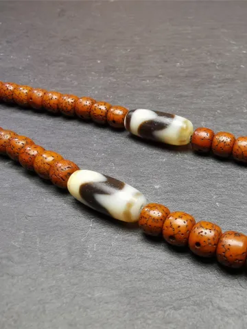 Gandhanra TibetanTiger Tooth Dzi Bead Accessories,Dzi Spacer Beads,Marker Beads for Mala,Necklace,amulet,0.32" × 0.79" $29.99