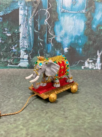 Elephant on a cart. Miniature. 1:12. Toy for a doll. Elephant. Animal for a doll.