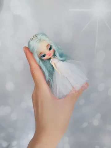 Miniature doll Blythe in the image of a beautiful princess.