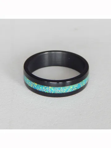 Stylish black ring. Carbon ring with synthetic opal. 9 1/4 $59.00