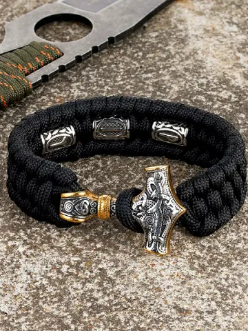 Paracord and stainless steel bracelet with Celtic runes and Thor's hammer $89.00