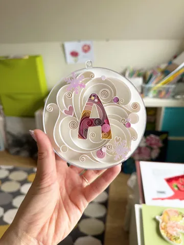 Custom initial in quilling technique