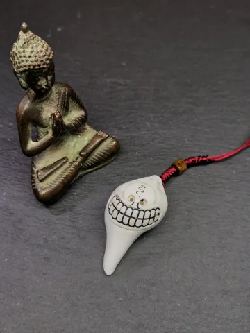 Gandhanra Tibetan Buddhism Amulet,Hand Carved White Conch Shell Shankha with Skull Citipati Symbol,Tibetan Ritual Implement - 2.2" × 1.14" $89.99