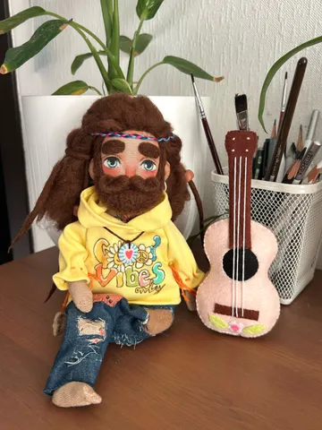 Textile doll Hippie man with tattoo and tiny felt guitar