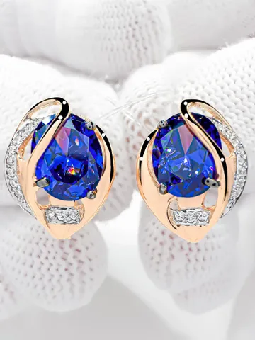 Earrings made of 925 silver (585 gold plated) with tanzanite and white cubic zirconia $125.00