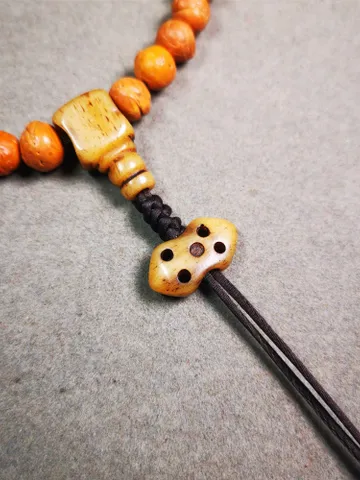Gandhanra Handmade Tibetan Pendant Bead,Yak Bone Carved Vajra Pendant Bead for Mala,0.7" * 0.4" $15.99