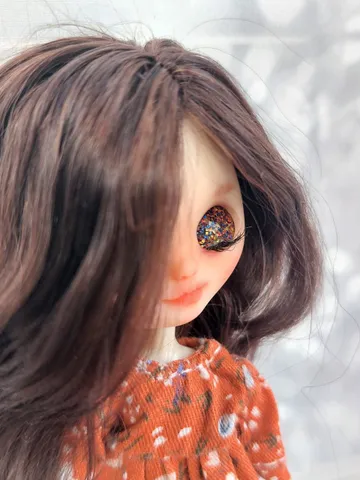 Petite Blythe doll with brown hair. Doll with eye mechanism. $228.00