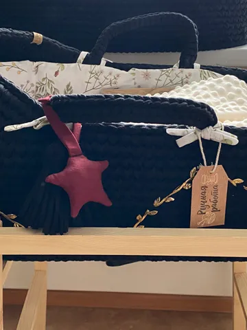 Knitted baby cradle
