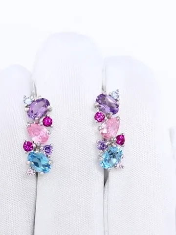 Silver earrings with topaz, cubic zirconia, amethyst and ruby corundum 925 assay value $125.00