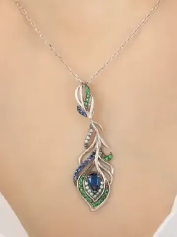 Women's neck pendant rhodium plated 925 sterling silver with cubic zirconia, Peacock Feather $95.00
