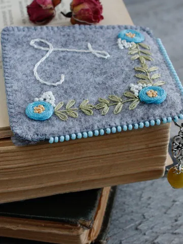 Personalized hand embroidered corner bookmark Scandinavian floral felt book mark bead Ukraine Handmade monogram bookmark floral yellow blue
